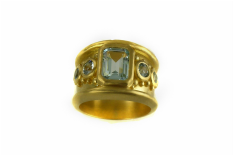 22-karat yellow gold, custom-designed Byzantine ring, emerald-cut blue topaz, bezel setting, granulation, sand-blasted finish