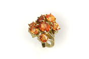bouquet of customer's orange Mandarin garnets, custom designed ring setting 18-karat yellow gold, hand engraving, prongs