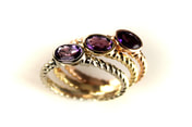 tri-color gold amethyst stack rings, graduated color amethysts, twisted shank, bezel settings